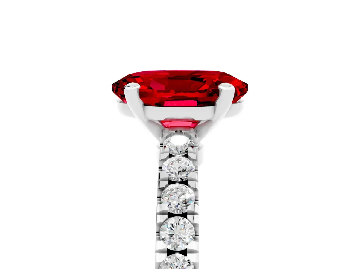 Oval Cut Solitaire Ruby with Pavé Band and Four-Prong Setting White gold