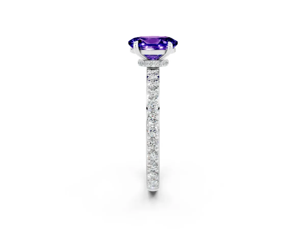 Oval Cut Tanzanite Solitaire Engagement Ring with Pavé Band and Four-Prong Setting Platinum