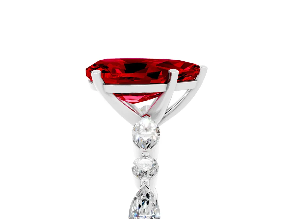 Pear Cut Ruby Ring with Marquise and Round Side Stones and Four-Prong Setting Platinum