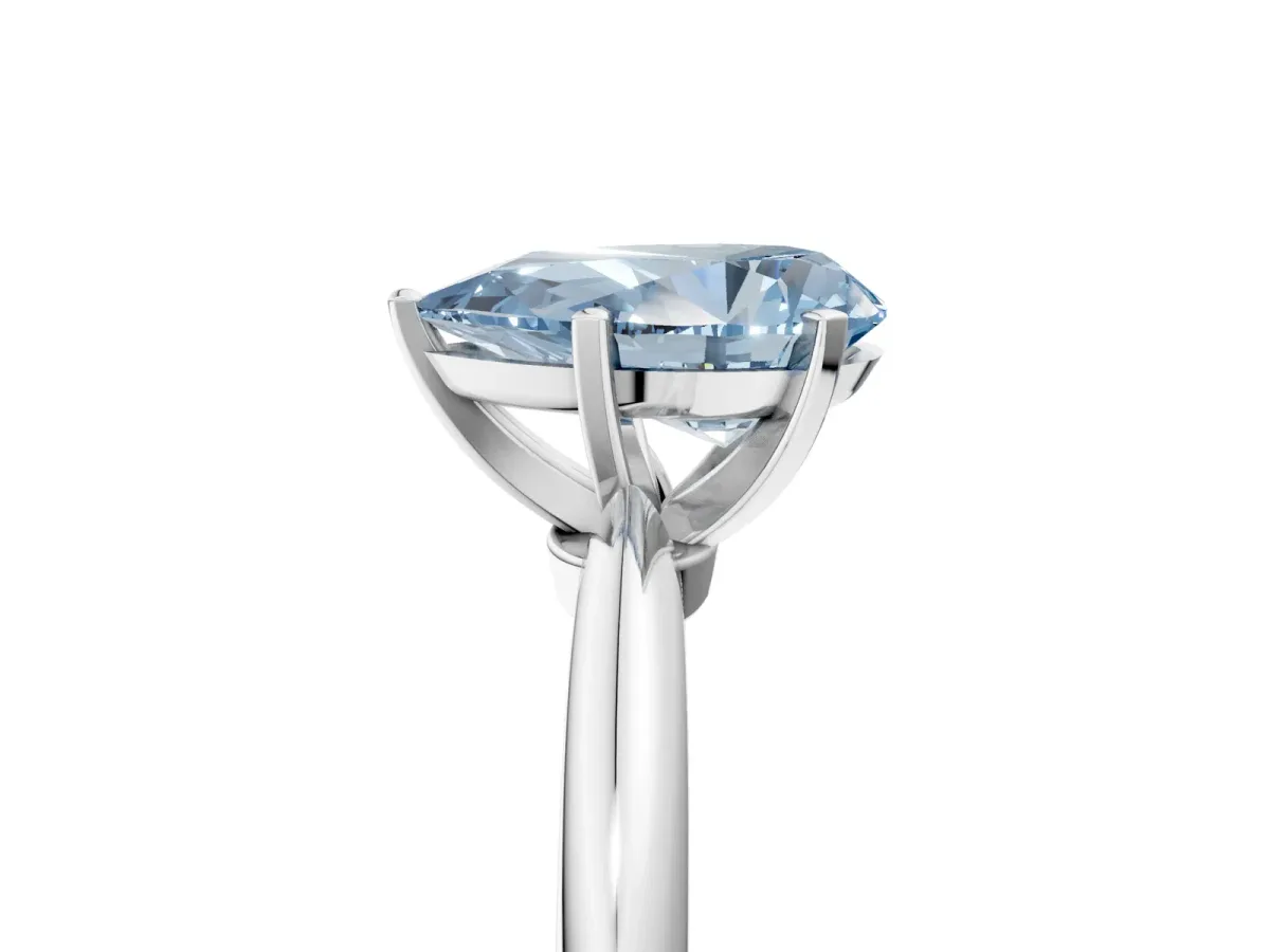 Fancy Blue Pear Cut Diamond Solitaire Ring with Six-Prong Setting and Classic Band Silver