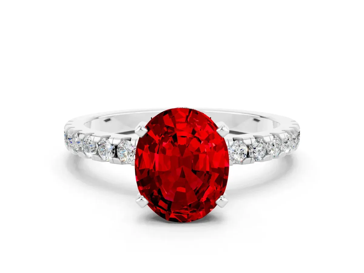 Oval Cut Ruby Solitaire Ring with Round Pavé Band and Four-Prong Setting White gold