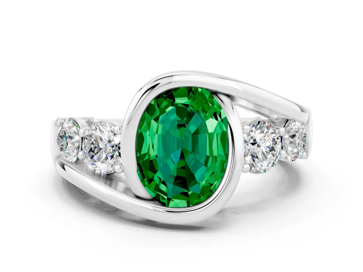 Bezel Set Oval Cut Emerald Bypass Ring with Round Accents Platinum