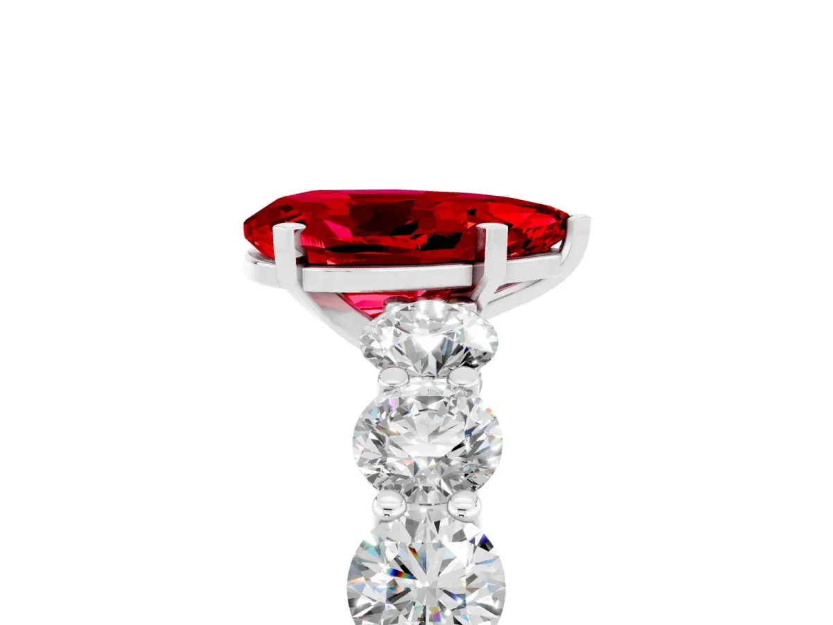 Pear Cut Ruby Prong Setting with Side Stones on a Pave Band Platinum