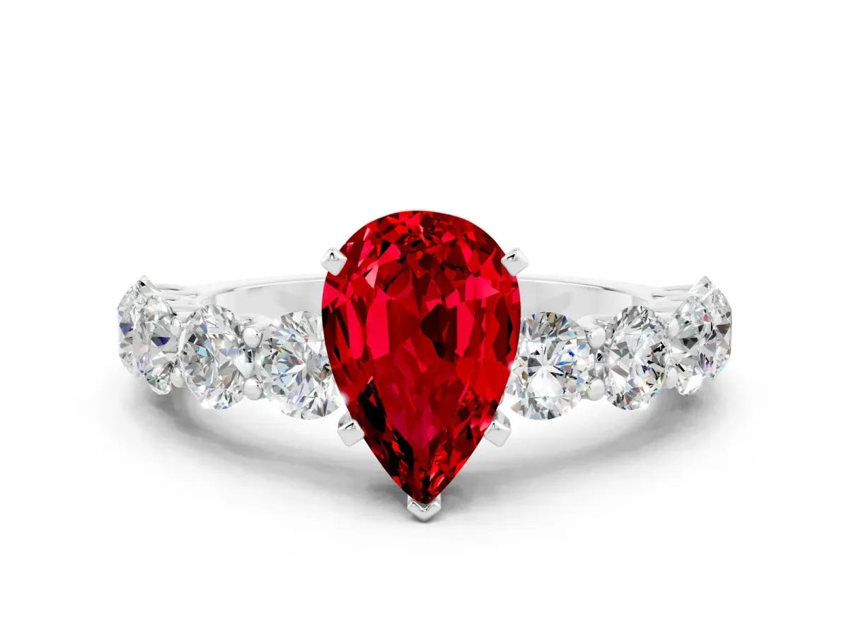 Pear Cut Ruby Prong Setting with Side Stones on a Pave Band Platinum
