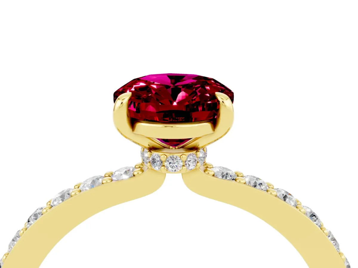 Oval Cut Garnet Solitaire Engagement Ring with Pavé Band and Four-Prong Setting Yellow gold
