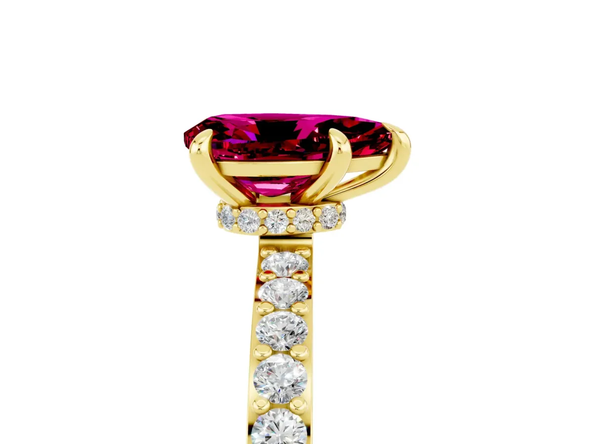 Pear Cut Garnet Solitaire Engagement Ring with Pavé Band and Four-Prong Setting Yellow gold