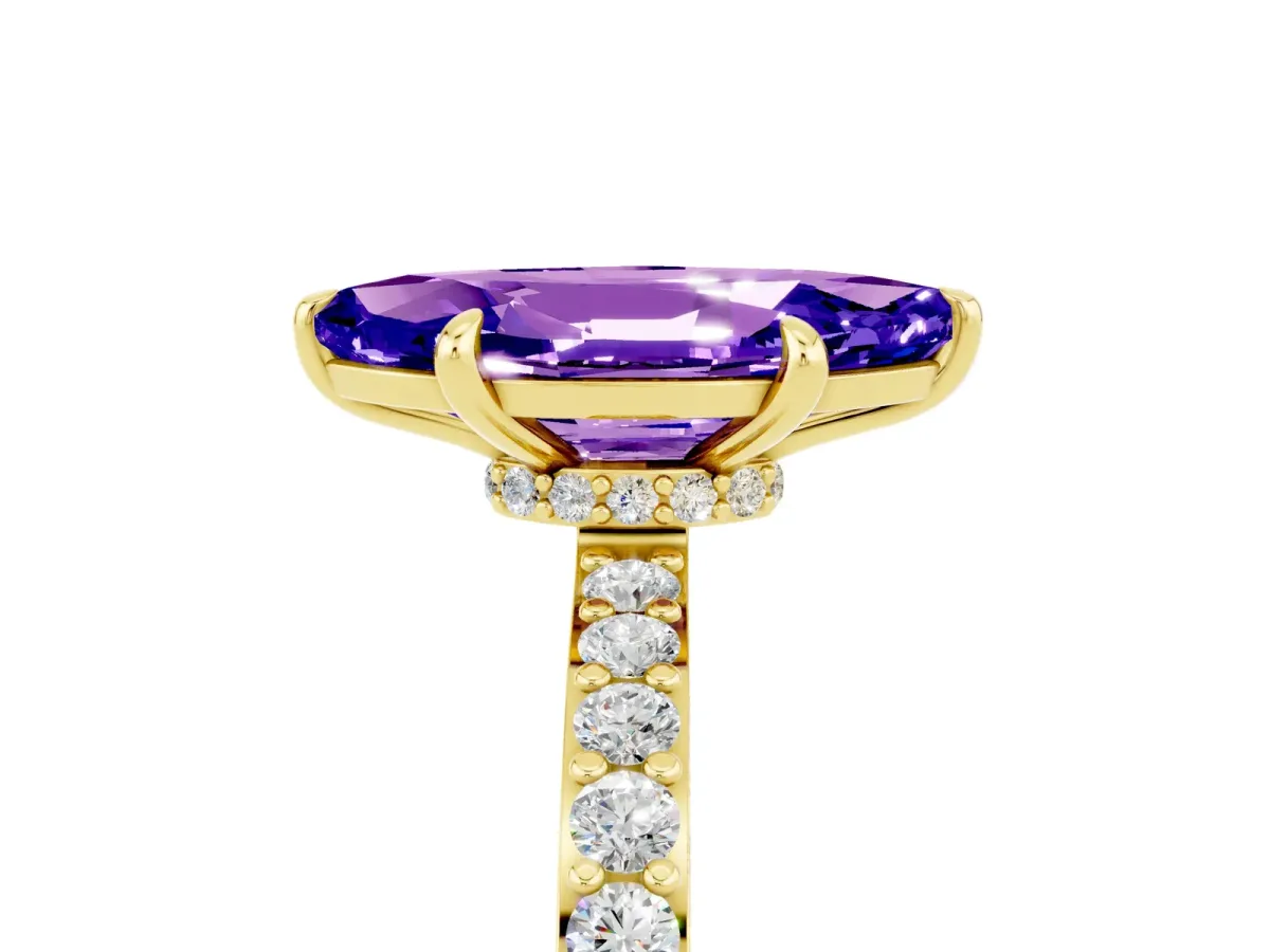 Marquise Cut Tanzanite Solitaire Engagement Ring with Pavé Band and Four-Prong Setting Yellow gold