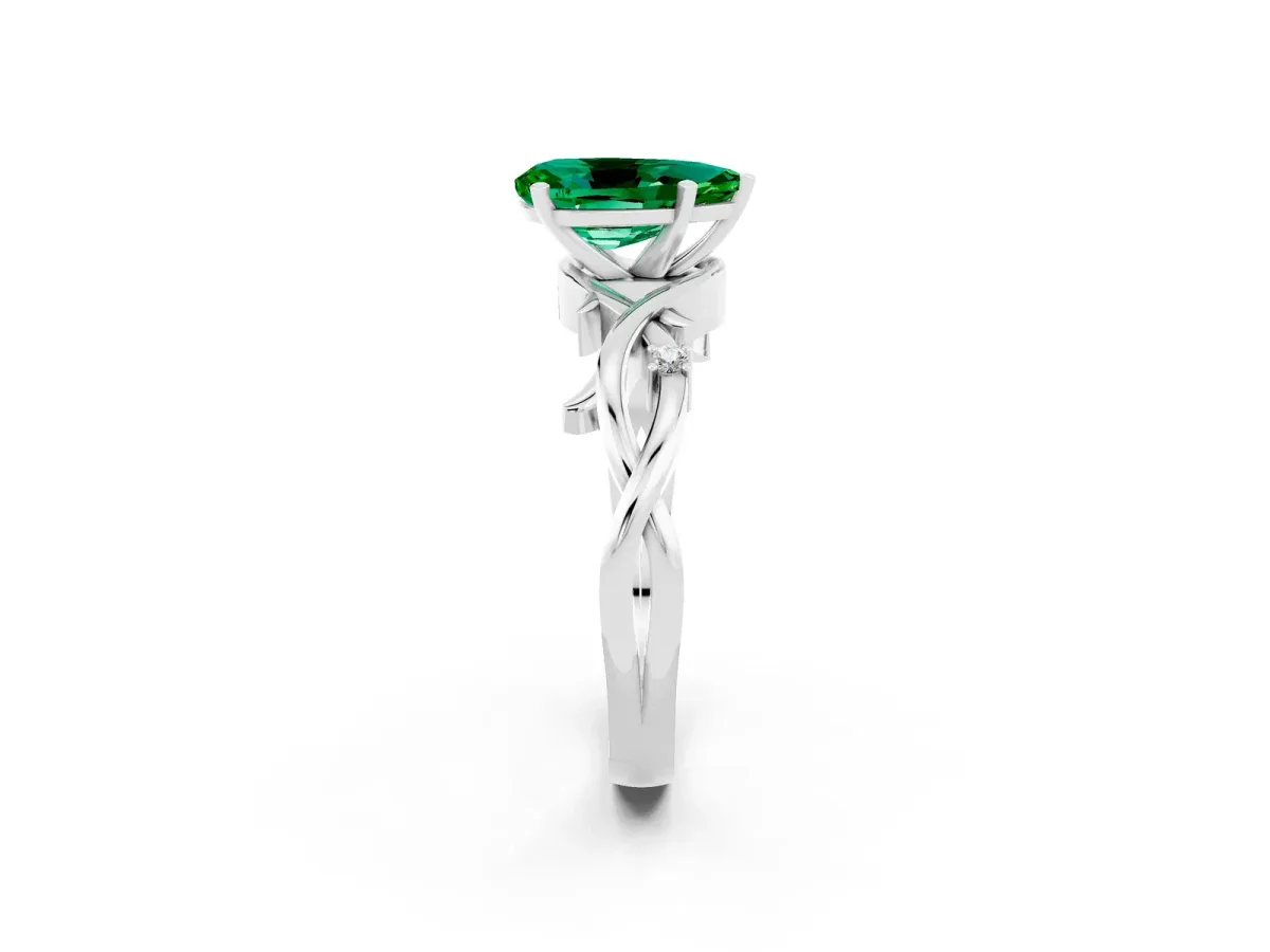 Pear Cut Emerald Solitaire Ring with Twisted Band and Prong Setting Platinum